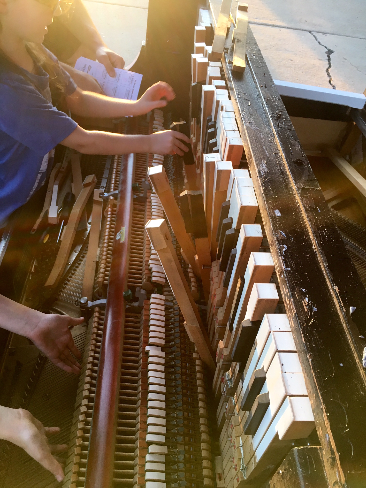 Disassembling the piano to see how it works was fascinating. Photo by Kelly Tompkins
