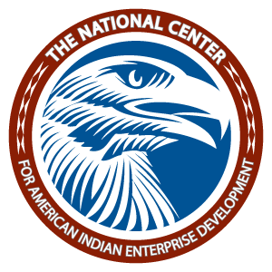 Logotipo circular con cabeza de águila, en el que se lee: "The National Center for American Indian Enterprise Development".