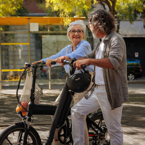 Seniors using electric bikes and scooters