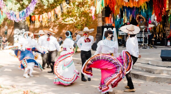 Dancers performing at the Dia de los Muertos celebration.