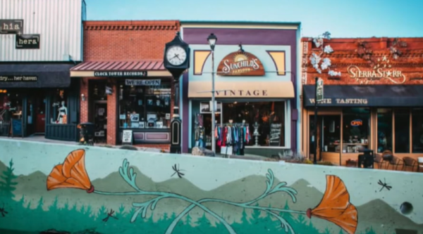 Mural and storefronts in a historic downtown