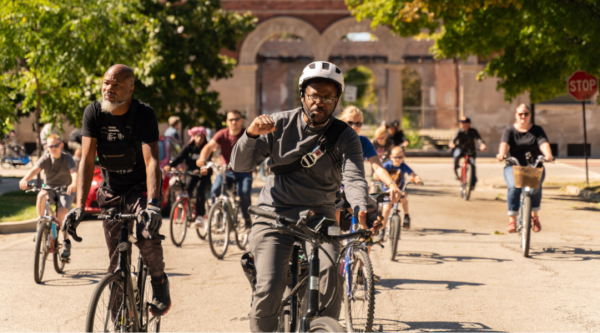 Equiticity founder, Oboi Reed, leads a community bike ride in Chicago’s Pullman neighborhood.