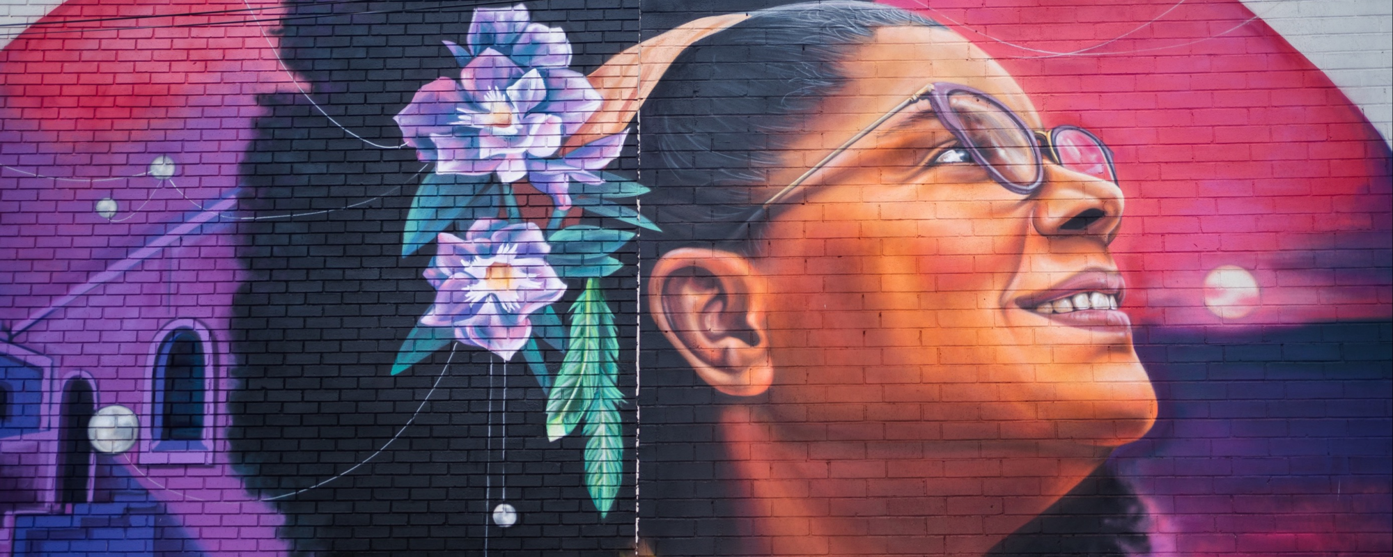 Vibrant mural of an African American woman.