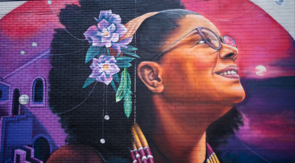 Vibrant mural of an African American woman.