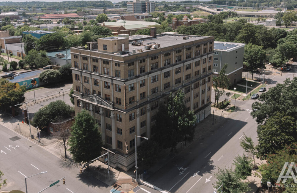 Aerial of a multi-story historic building.
