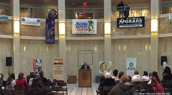 Former NMCMSC President Francis Bee of Gallup addresses the crowd at the MainStreet in New Mexico Day at the New Mexico State Capitol Rotunda