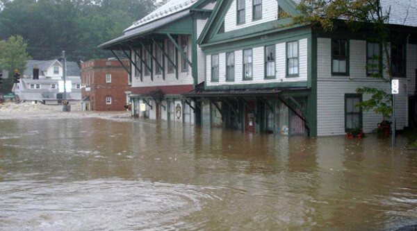 Flooded downtown with water up to first floor windows of historic buildings