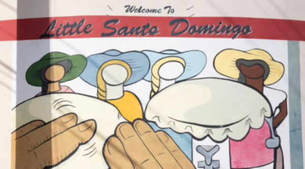 Mural depicting people playing drums, text reads "welcome to Little Santo Domingo"
