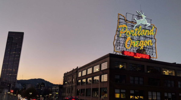 Iconic neon sign in Portland featuring a leaping deer