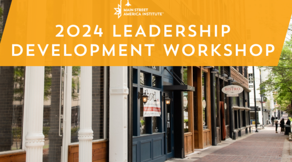 2024 Leadership Development Workshop. Photo of historic buildings and a brick sidewalk.