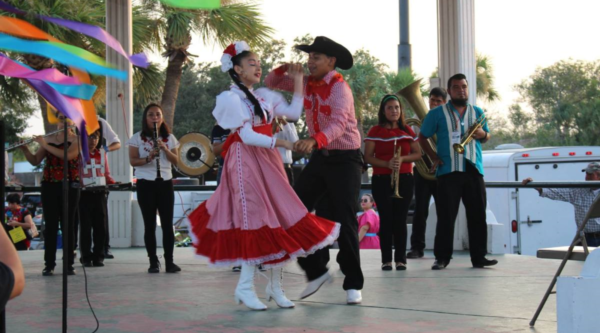 Dancers and musicians in traditional Mexican folk dress
