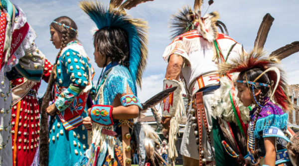 Tribal members of the Crow Nation perform traditional ceremonial dances to celebrate and share their heritage at the First People’s Pow Wow in Sheridan, Wyoming
