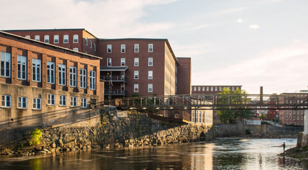 Mill buildings along the river in Biddeford, Maine