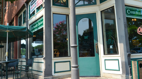 Photo of a corner coffee shop in a historic downtown