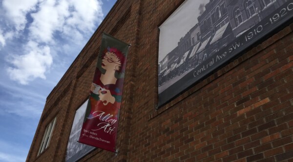 YoMS Banner Project on the historic Armory building in downtown Le Mars.
